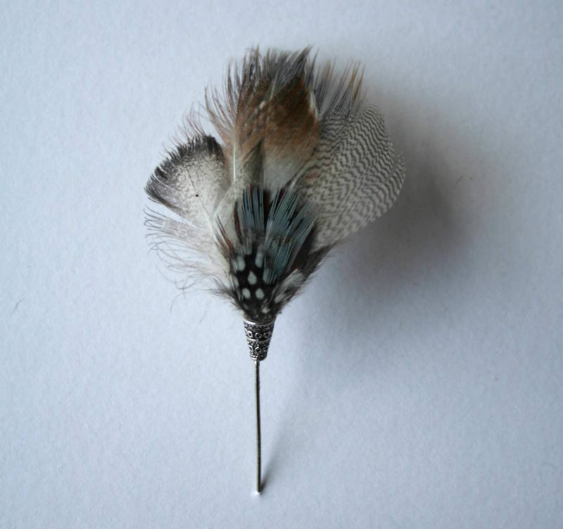 Feather Lapel Pin Game Fare