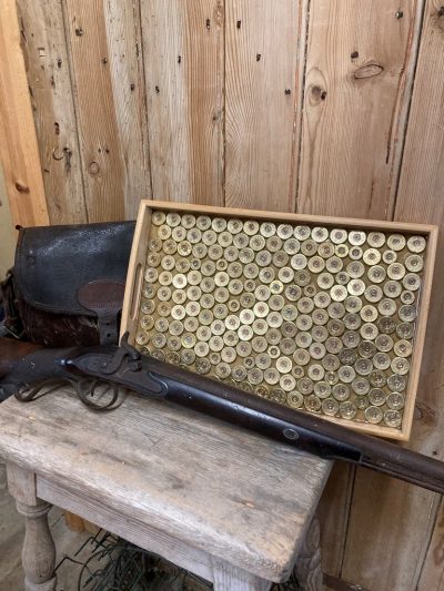 Drinks tray featuring upcycled shotgun cartridges.